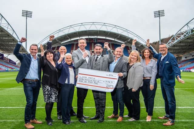 Three long-term members of the Huddersfield Hundred clubbed together to put on a special charity ball raising £18,000 for three local charities. Picture: Mark Flynn