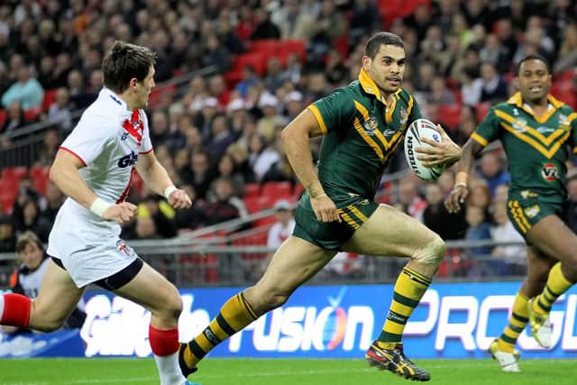 Australia's Greg Inglis evades England's Gareth Widdop in the 2011 Four Nations at Wembley (SWPix)