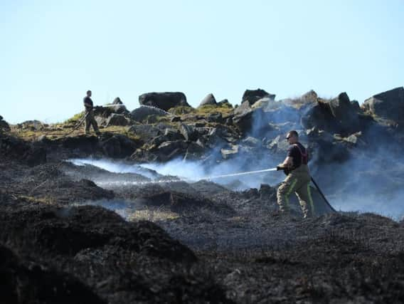 Fire crews battling the fire on Sunday