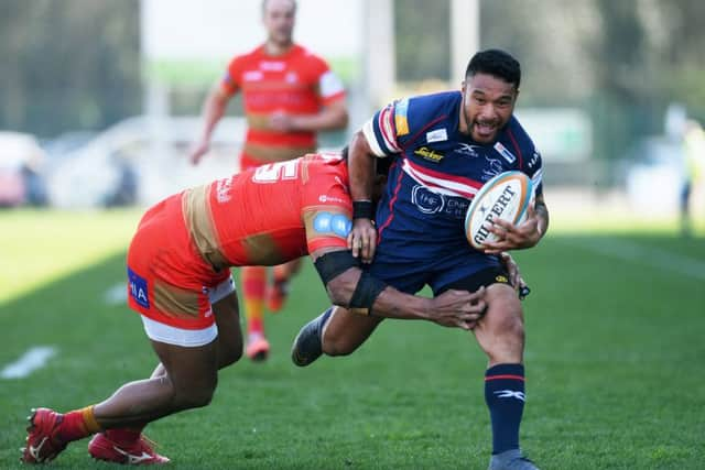 NO GO: Doncaster's Dwayne Polataivao is tackled by Coventry's David Halaifonua. Picture: Jonathan Gawthorpe