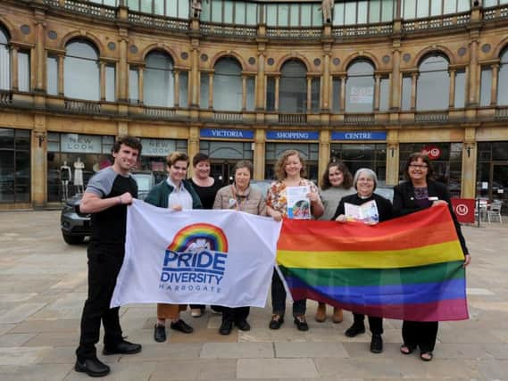 The Pride in Diversity organisers pictured outside the Victoria Shopping Centre: from left - Dan Mazza, Elijah Thompson-Vear, Rosie Keeling, Liz Nightingale, Summer MacInnes, Charlotte Keeling, and Leonora Wassell, with Victoria Shopping Centre's deputy manager Lyn Wardell. Picture: Gerard Binks.