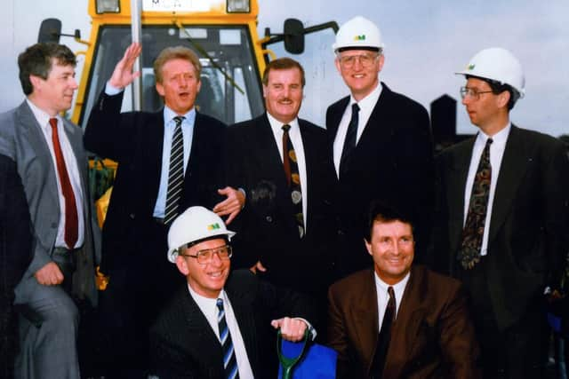 NEW ERA: George Binns, bottom left, at the groundbreaking of the new stadium.