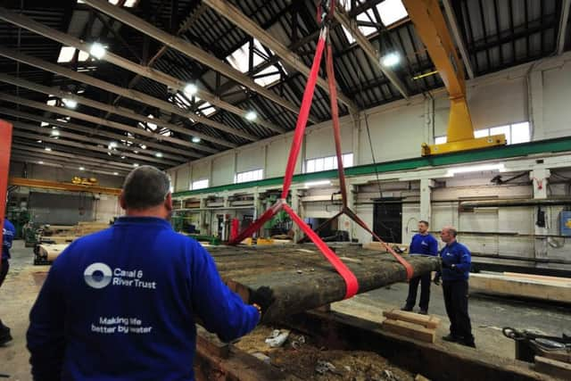 Six tonnes of genuine lock gates depart Canal & River Trusts Stanley Ferry workshop in Wakefield after six weeks of work to prepare them for their star moment as the centrepiece of this years Welcome to Yorkshire Chelsea Flower Show Garden. Picture by David Saunders.