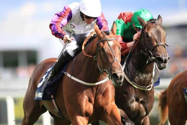 Karl Burke's stable star Laurens, pictured winning at Doncaster in 2017 under PJ McDonald, is due to reappear at Newbury this weekend.