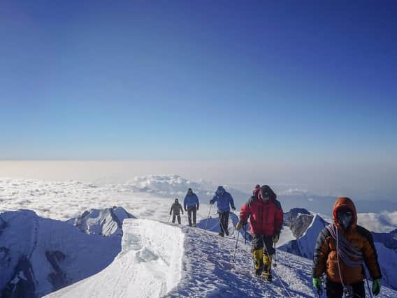 A generic picture of climbers at the Himalayas.