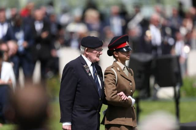 Veteran Frank Baugh, 95, who served as a signalman with the Royal Navy on a landing craft during D-Day, attends the Royal British Legion's Service of Remembrance, at the Commonwealth War Graves Commission Cemetery, in Bayeux, France, as part of commemorations for the 75th anniversary of the D-Day landings.