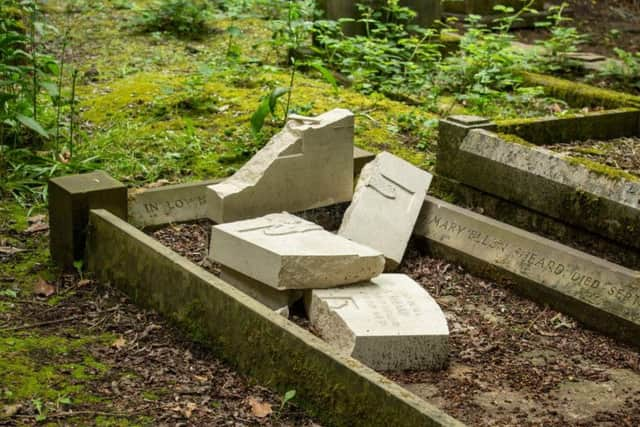 One of the gravestones that was found smashed in a cemetery in the run-up to D-Day