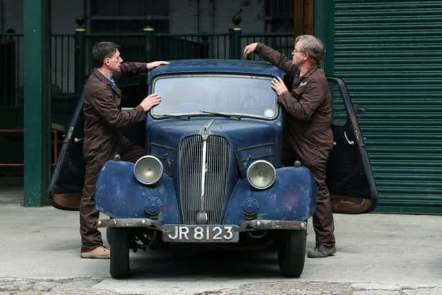 The Jowett 10 arrives at Bradford Industrial Mueum, with the help of the Jowett Car Club's Chris Spencer and Paul Beaumont.
 
Picture: Jonathan Gawthorpe