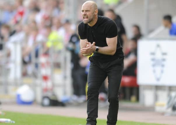 Carry on: Paul Warnes management style has been praised by his chairman at Rotherham, Tony Stewart (Picture: Dean Atkins)