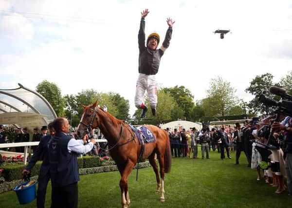 Frankie Dettori celebrates his Ascot Gold Cup win on Stradivarius.