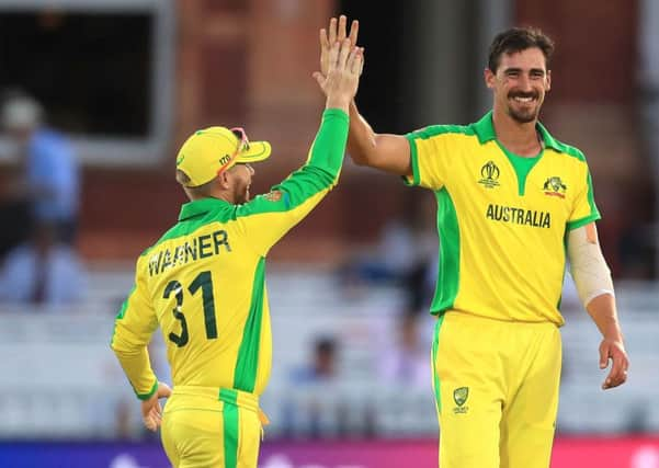 Got him: Australia's Mitchell Starc celebrates the wicket of New Zealand's Lockie Ferguson.