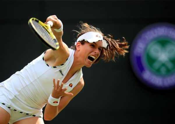 SAFE PASSAGE: British No 1 Johanna Konta beat Ana Bogdan 7-5 6-2 in her first-round match at Wimbledon yesterday. Picture: Adam Davy/PA