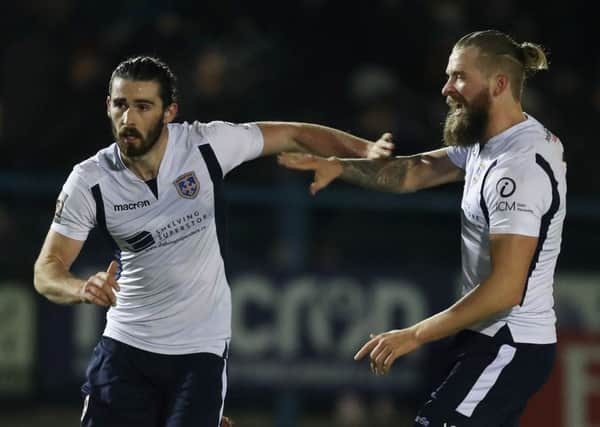 Swedish test: Guiseley's Alex Purver, left.