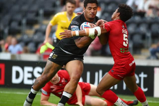 Hull FC's Bureta Faraimo charges through London Broncos' Kieran Dixon on the way to setting up Josh Griffin's try. (PIC: HULL FC)