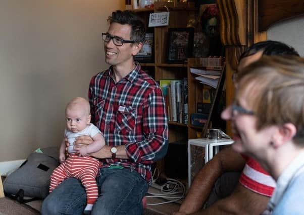 Daniel Bye with his baby son Arthur. Picture: Jonathan Ackley.