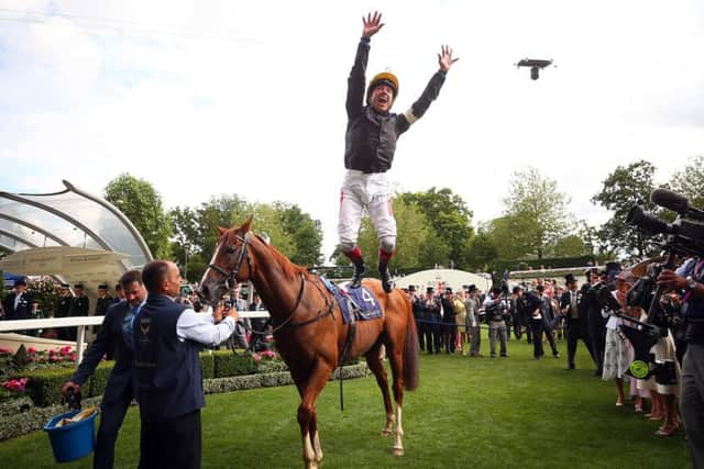 Frankie Dettori celebrates the Ascot Gold Cup win of Stradivarius.