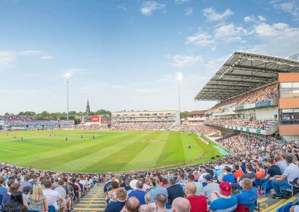 Old and the new: Spectators in the West Stand take in a game involving Yorkshire at Emerald Headingley, with the recently built stands to the left and right. (Picture: Allan McKenzie/SWPix.com)