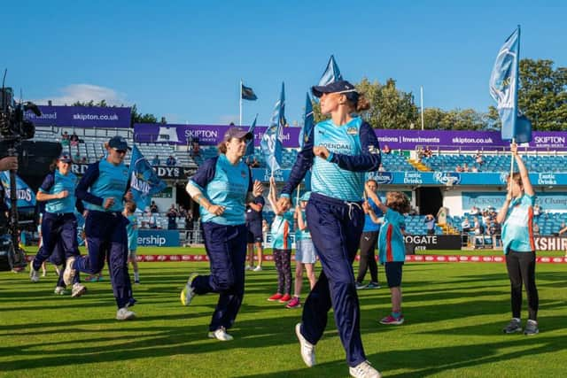 Lauren Winfield leads her team out at Emerald Headingley (Picture: Alex Whitehead/SWpix.com)