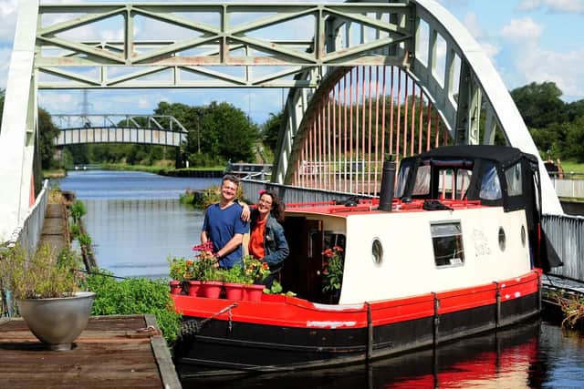 Sydney Thornbury, the CEO of The Art House, on her boat with friend Tony Wade.