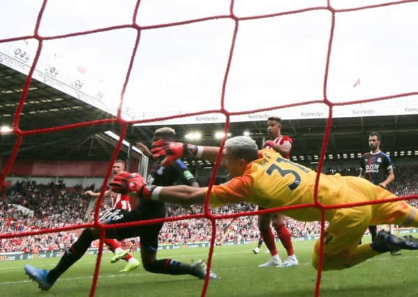 John Lundstram nets the Blades winner. Picture: Simon Bellis/Sportimage