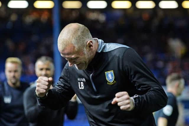 Lee Bullen celebrates the win against Luton