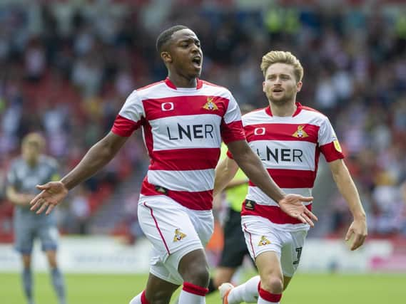 Niall Ennis celebrates his stunning goal against Lincoln. Picture: Scott Merrylees