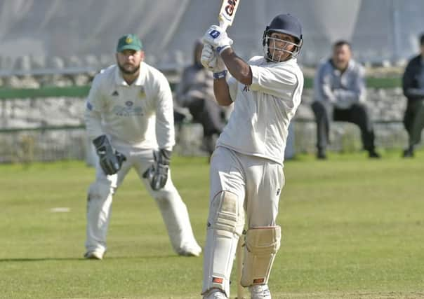 Title-clincher: 
Tim Jackson on his way to 71 for champions Woodlands. Picture: Steve Riding