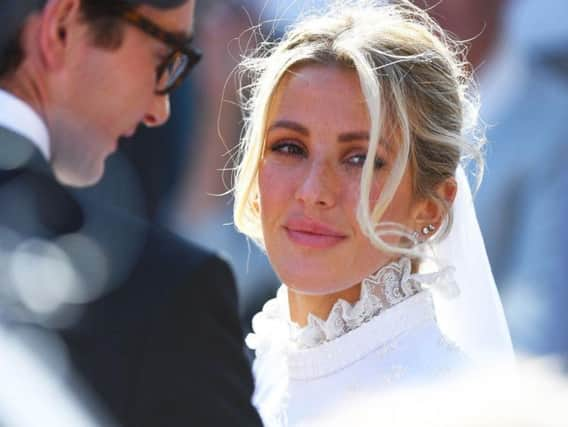 Newly married Ellie Goulding and Caspar Jopling leave York Minster Picture James Hardisty/PA Wire