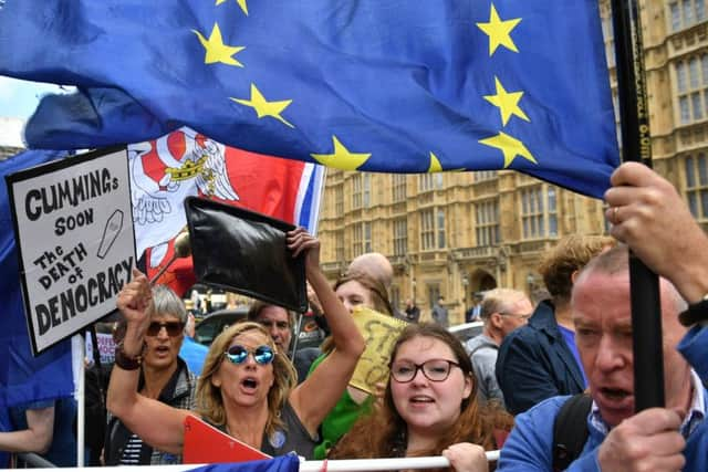 Pro-EU supporters have gathered outside Parliament.