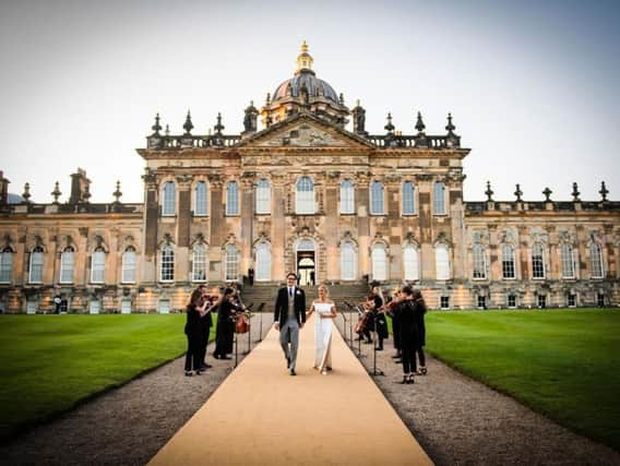 Caspar and Ellie in front of Castle Howard