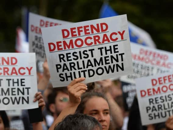 Protestors from Another Europe is Possible outside the Houses of Parliament, London, to demonstrate against Prime Minister Boris Johnson temporarily closing down the Commons. Photo: Kirsty O'Connor/PA Wire