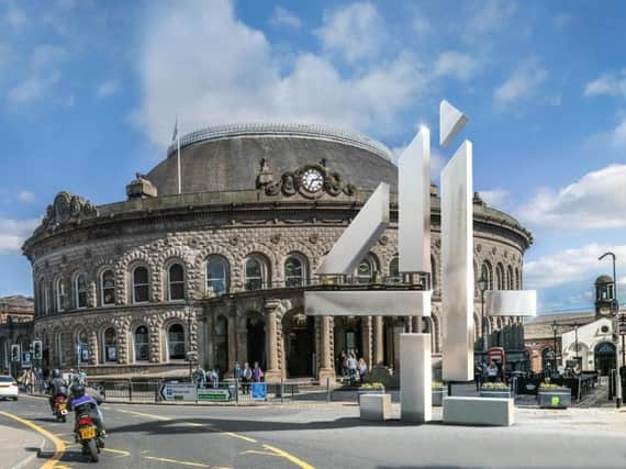 A Channel 4 ident logo in front of Leeds's Corn Exchange.