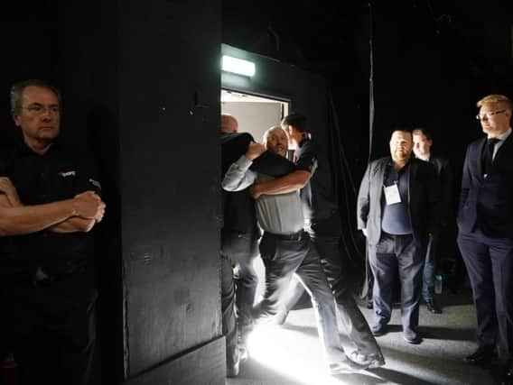 Ben Gilchrist is ejected as Prime Minister Boris Johnson makes a speech at the Convention of the North at the Magna Centre. Photo: Christopher Furlong/Getty Images)