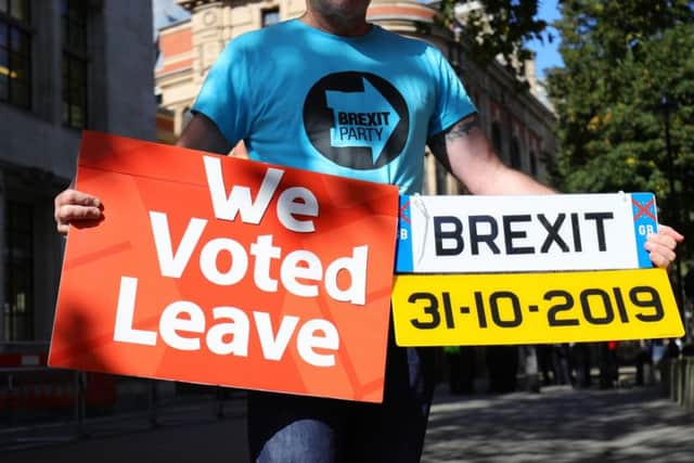 Protesters outside the Supreme Court, London, where judges are considering legal challenges to Prime Minister Boris Johnson's decision to suspend Parliament.