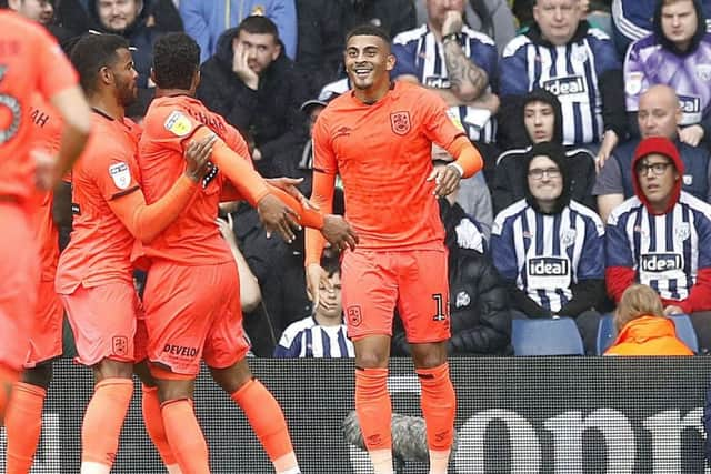 Huddersfield Town's Karlan Grant celebrates scoring his team's second goal against West Bromwich Albion. Picture: Martin Rickett/PA.