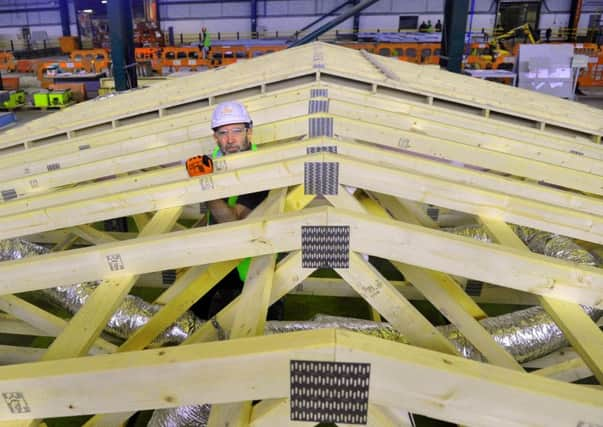 Mark Chilvers, operations director at Ilke Homes at Flaxby near Knaresborough, working on the roof joists of a modular buuilding. PHOTO: Gary Longbottom.