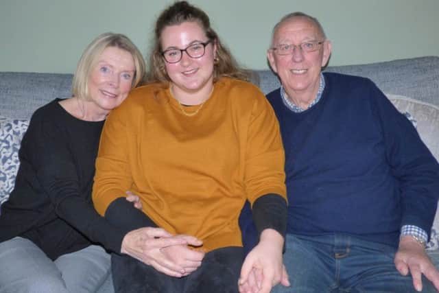 Martha Hogg (centre) with Keith Procter and his partner Kathy. Matha saved Kieth's lilfe after learning CPR at school