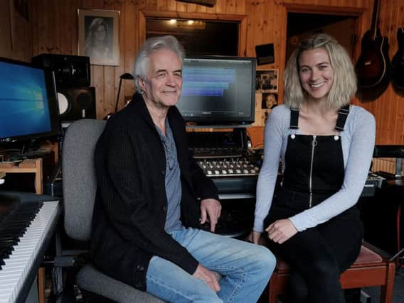 Dave Lowe and his daughter Lucy at his Scarborough home.