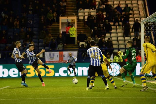 Morgan Fox hammers in the second goal which looked like being the winner.    Pic Steve Ellis