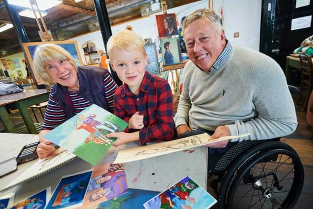 left to right: Illustrator Lynne Hickin, Charles and author Brian Abram Picture: johnhoulihan.com