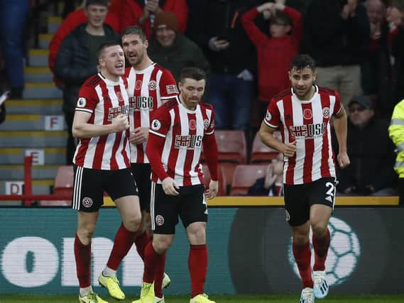 John Lundstram (left) and Sheffield United team mate John Fleck (second right): Simon Bellis/Sportimage