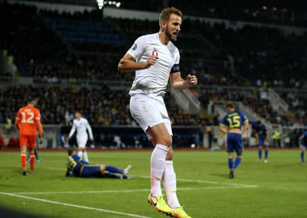 captains class: Harry Kane celebrates scoring Englands second goal against Kosovo, a strike that ensured he scored in every one of his sides Euro 2020 qualifiers. (Picture: Steve Paston/PA)