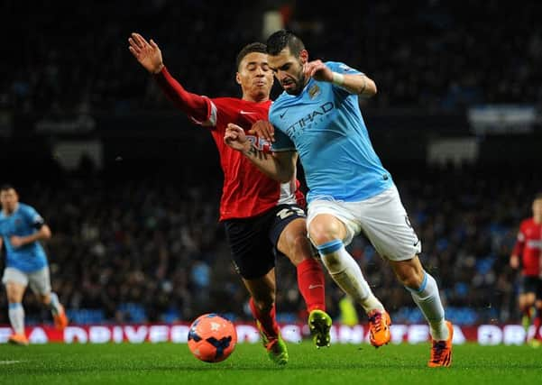 Adam Henley (left) playing for Blackburn against Alvaro Negredo of Manchester City in an FA Cup third-round replay in January 2014 (Picture: PA)