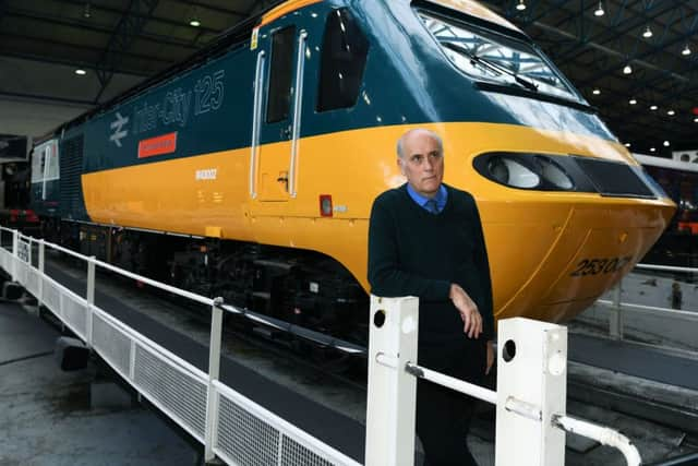 National Railway Museum associate director Bob Gwynne with the very first Inter-City 125 locomotive The Sir Kenneth Grange.  (Jonathan Gawthorpe).