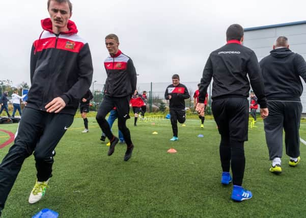 Members of the Sheffield FC Disability adult team take part in a skills set.