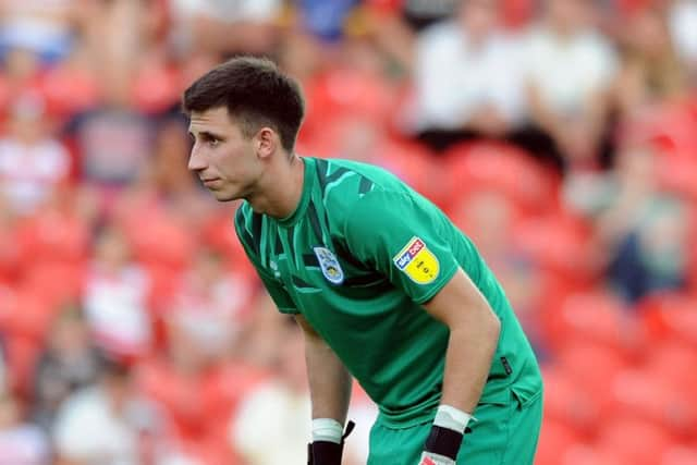 KEY SAVES: Huddersfield Town goalkeeper Kamil Grabara. Picture: Tony Johnson.