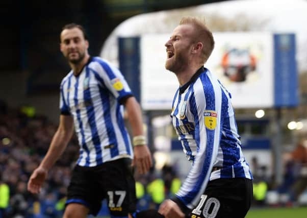 Owls' Barry Bannan converts from the penalty spot to win the match.   Pic Steve Ellis