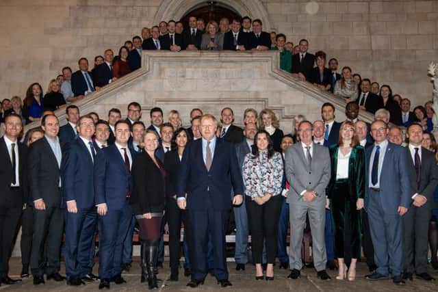 Boris Johnson with the newly-elected intake of Tory MPs.