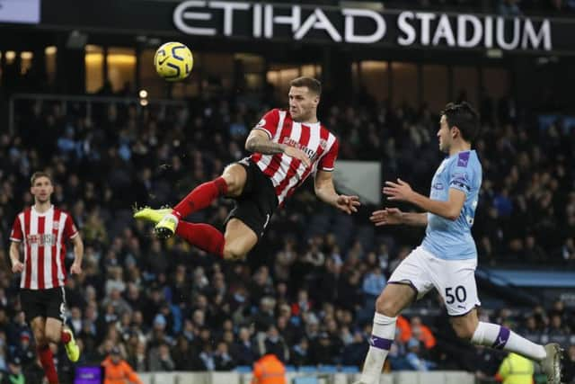 Sheffield United's Billy Sharp heads against the post in stoppage time