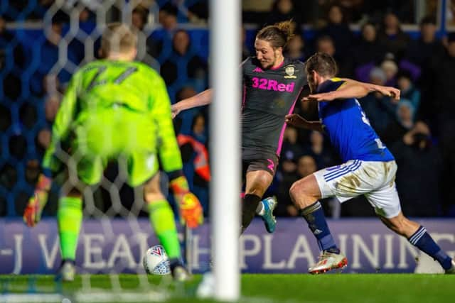 Luke Ayling fires in a shot which is deflected off Wes Harding (Picture: Bruce Rollinson)